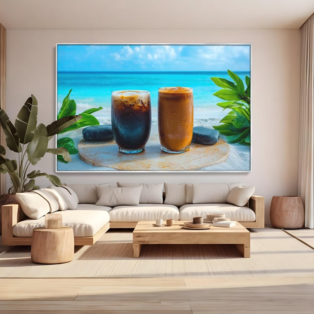 Tablou canvas cu doua pahare cu cafea pe plaja, in rama de aluminiu argintiu, pe perete intr-un living